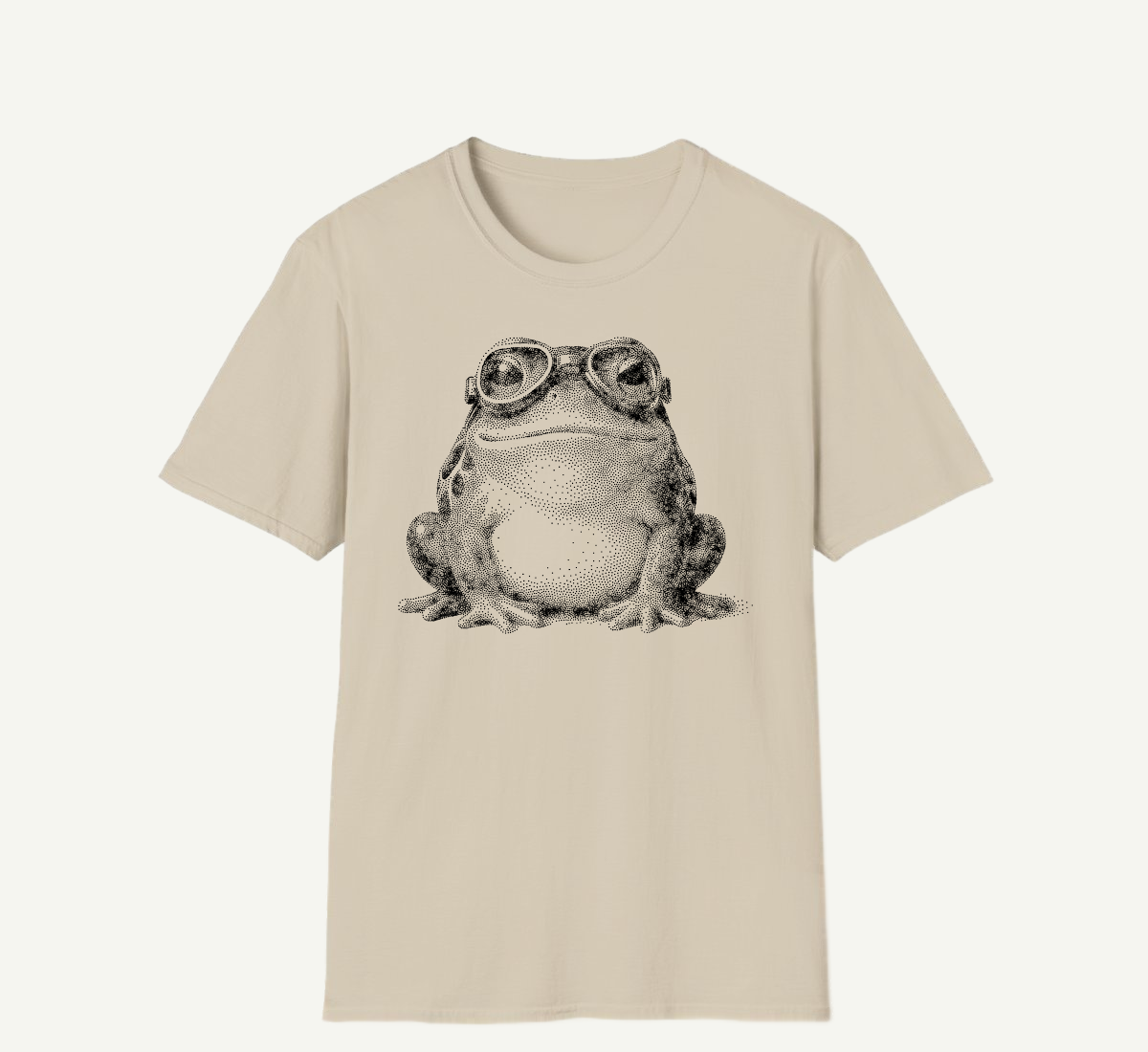 The same frog on a sand tee — the same black ink, a different cloth